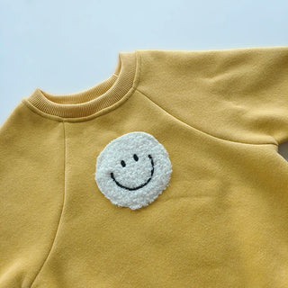 Fuzzy Smile Bodysuit - RYAN AND REMI